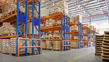 A warehouse filled with lots of shelves and boxes.